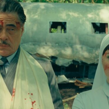 Benicio Del Toro as Zsa-Zsa Korda and Mia Threapleton as Liesl in director Wes Anderson's THE PHOENICIAN SCHEME