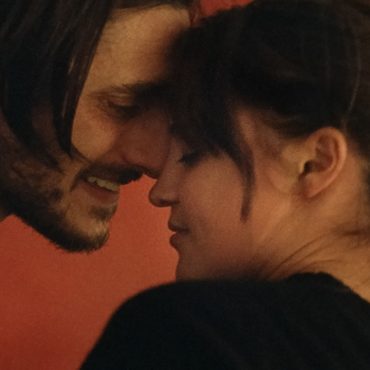 Luca Marinelli and Alicia Vikander in The Echo Chamber